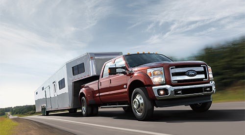 ford truck towing a fifth-wheel trailer