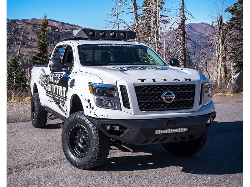 Lifted Nissan Titan >> Tuff Country 4 Inch Lift Kit Without Shock Absorbers For The Nissan Titan Xd 4wd Lifted Nissan Titan >> Tuff Country 4 Inch Lift Kit Without Shock Absorbers For The Nissan Titan Xd 4wd